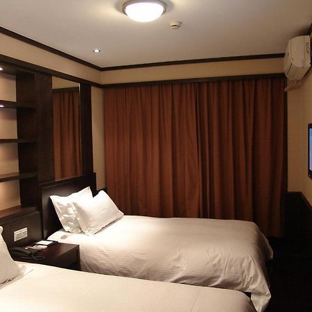 Baolong Homelike Hotel Shanghai Room photo